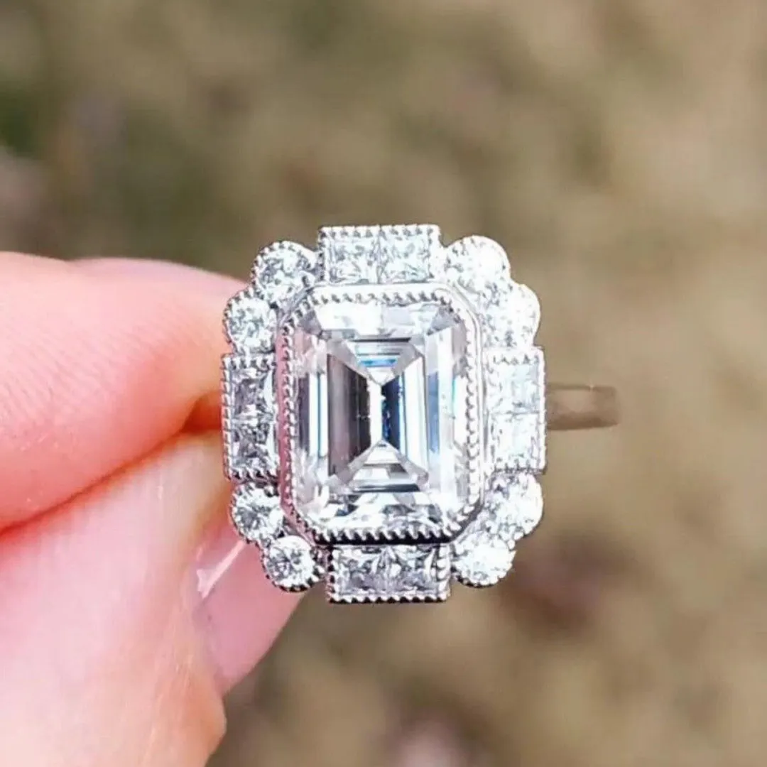 /public/photos/live/Vintage Inspired Emerald Moissanite Halo Engagement Ring 637 (1).webp